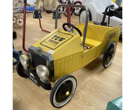 A child's pedal tow truck  Please see our terms and conditions in relation to collection