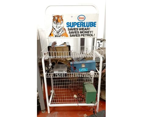 An Esso Superlube forecourt stand, 64 cm wide, and four battery chargers (for decorative purposes only)  Please see our terms