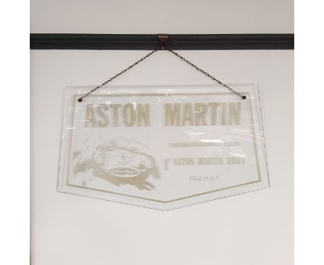 An Aston Martin Nurburgring 1959 glass panel, 68.5 cm wide  Please see our terms and conditions in relation to collection