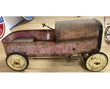 A child's 1930's Duke-Express pedal car, ripe for restoration  Please see our terms and conditions in relation to collection