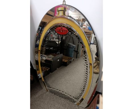 A motoring wall mirror, in the form of a Bugatti radiator grill, 81 x 58.5 cm  Please see our terms and conditions in relatio