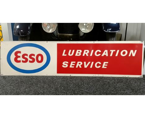 An Esso Lubrication Service metal sign, 46 x 183 cm  Please see our terms and conditions in relation to collection