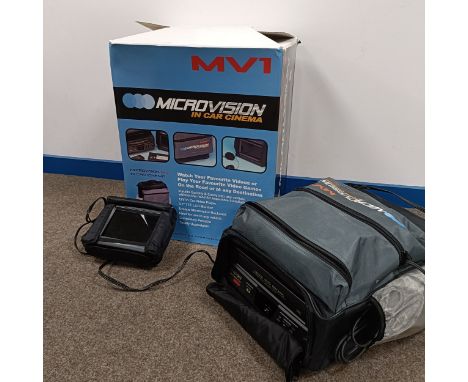An MVI Microvision In Car Cinema, boxed  Please see our terms and conditions in relation to collection