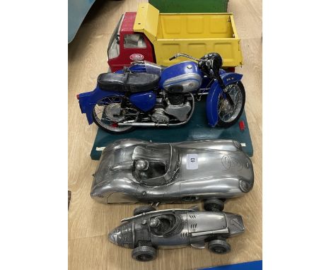 A Tonka truck, two models of racing cars, and a model of a BSA A7 with a sidecar  Please see our terms and conditions in rela