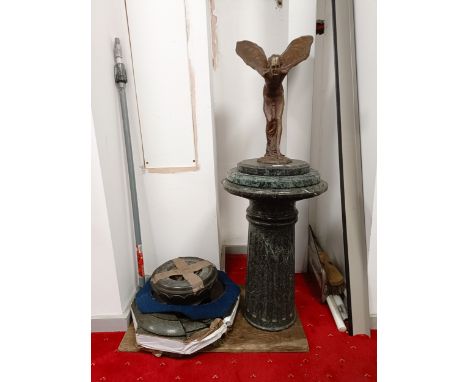 After Charles Sykes, a large bronze Spirit of Ecstasy, approx 44 cm high, on a green marble column, most likely from a Rolls-