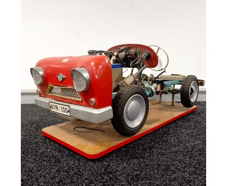 A German VVR 100 cutaway car, with moving parts, on a base, 98 cm wide  Please see our terms and conditions in relation to co