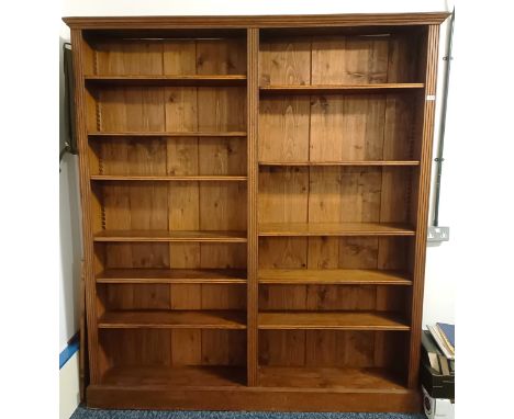 A modern open bookcase, with adjustable shelves, 186 cm wide x 28 cm deep x 208 cm high  Please see our terms and conditions 
