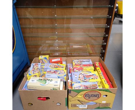 A collection of Corgi Classics vehicles, including Chipperfields Circus, all boxed, and a display cabinet, 116.5 cm wide  Ple