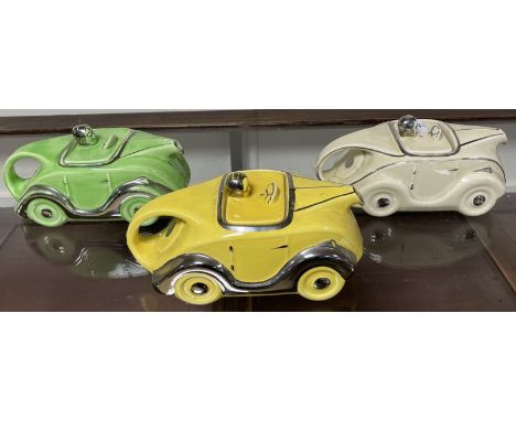 Three Sadlers OKT 42 racing car pottery teapots  Please see our terms and conditions in relation to collectionoverall some cr