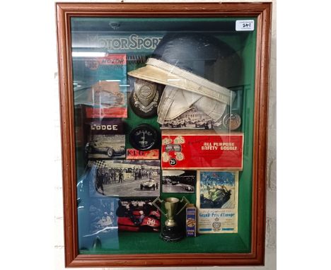 A racing car diorama, in a box frame, 45 cm wide  Please see our terms and conditions in relation to collection