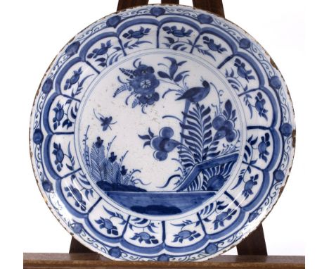 A Delftware charger circa 1800 with Chinese style painted decoration, 36cm