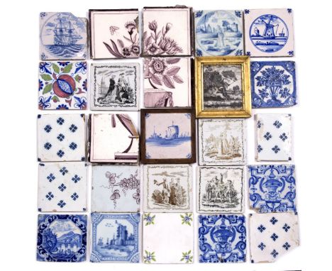 A quantity of Delftware tiles variously painted in manganese and blue (18) Provenance - Aurea Carter.