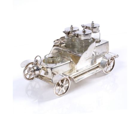 A silver plated condiment set in the form of a vintage motor car, 20cm long