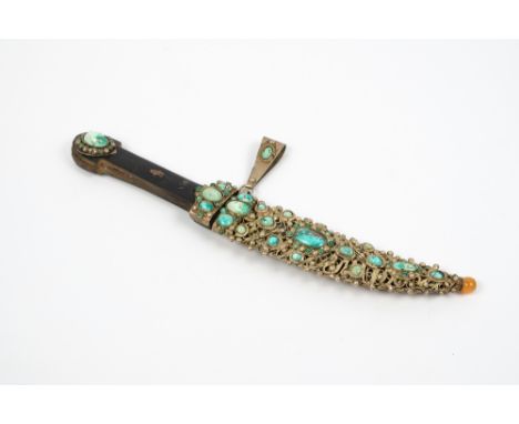 An Eastern dagger with turquoise and silver metal scabbard and horn handle