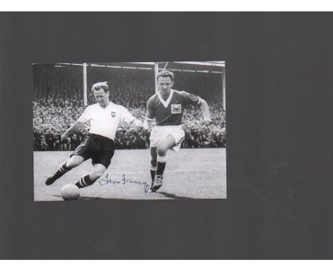 Tom Finney signed 6x4 black and white action photo of him playing for Preston North End. Good condition
