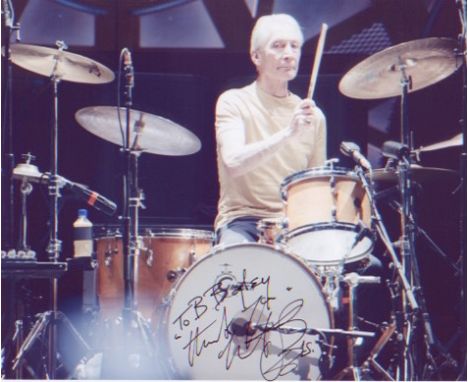 Rolling Stones - Charlie Watts. A dedicated 10x8 signed picture of Watts behind the drums. Excellent. 