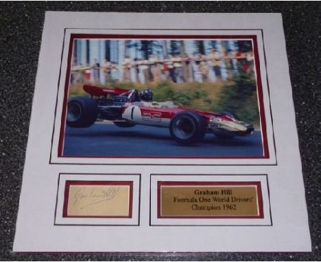 Graham Hill signed presentation. A 20cm x 28cm image in a double 3D mount to an overall size of 38cm x 38cm, together with a 