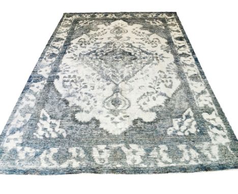 VINTAGE KERMAN CARPET, 294cm x 195cm, palmette and vine design in an en gris bleu finish.