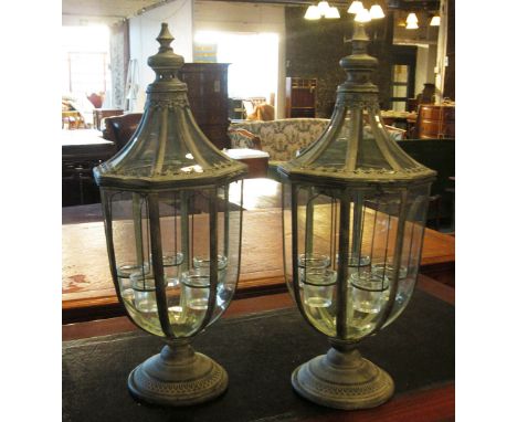 GARDEN LANTERNS, a pair, verdigris metal framed and glazed enclosing five tea light holders, 74cm H x 29cm W. (2)