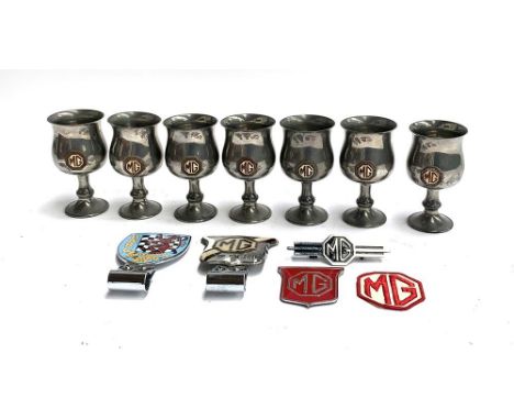 Automotive interest, a set of six Tudric MG wine goblets; together with a British automobile Racing Club bumper badge L9626; 