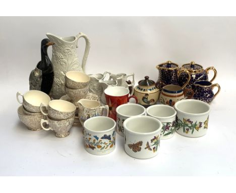 A mixed lot of ceramics to include four Portmeirion bisque jugs; Burslem blue and gilt part tea set; Portmeirion botanic gard