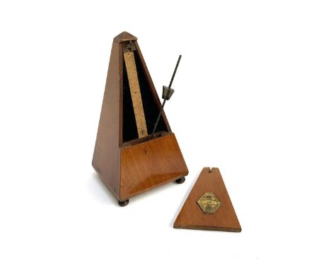 A mechanical metronome marked Maelzel Paris 