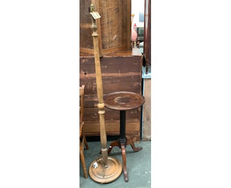 An oak and mahogany tripod table, with fluted column (af), 74cmH; together with a turned wood standard lamp 