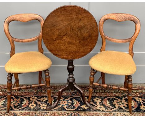 A 19th century mahogany tip-top tripod occasional table, 49x68cm; together with a pair of upholstered balloon back chairs 