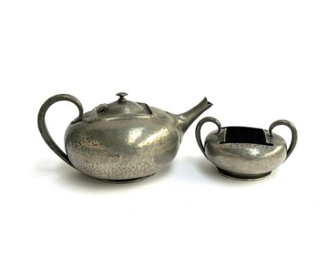 A Liberty &amp; Co. Tudric pewter teapot, marked 0966, together with matching twin handled sugar bowl, 0966 (2) 