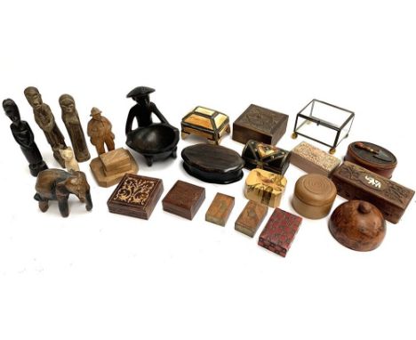 A quantity of trinket boxes to include treenware; together with carved wooden figurines 