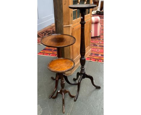 An early 19th century circular tripod table, 43cmD 71cmH; together with a dished tripod pot stand, 111cmH and a wine table, 5