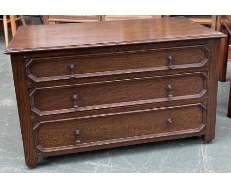 A low oak chest of three drawers, drawer front with geometric mouldings, 92x47x53cm 