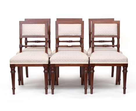 A set of six mahogany dining chairs, possibly military, each frame bearing the Broad Arrow impression, with upholstered back 
