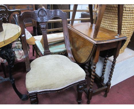 A 1920's Oak Gate Leg table, with drop leaves on barley twist and block supports, united by stretchers, together with a XIX C