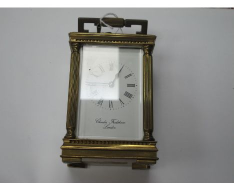 Charles Frodsham of London Brass Cased Carriage clock, with reeded corner pillars, bevelled glass panels, Swiss movement, 8cm
