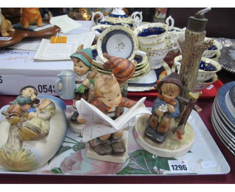 Hummel, Boy by Tree Lamp, three figurines including boy reading Munchener Presse, oval florist wall posy. (damaged)