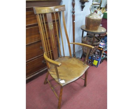 An Art Nouveau Ash and Mahogany Spindle Back Arm Chair, with inlaid splat, dish seat and bowed arms, on circular tapering leg