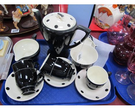 A 1950's Myott "Spotlight" Coffee Set, comprising six demi-tasse coffee cups (one broken) and saucers, sugar bowl, milk jug a