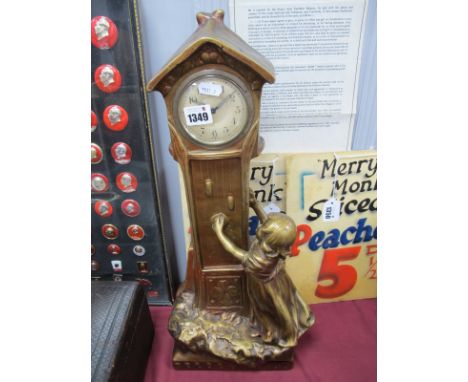 Art Nouveau Continental Plaster Mantle Clock, of a girl by the side of a long case clock, with impressed mark L.M.H 797, 53cm
