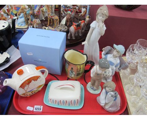 Four Nao Figurines, Poole butter dish, Wedgwood Clarice Cliff orange Taormina teapot, Doulton Jug.