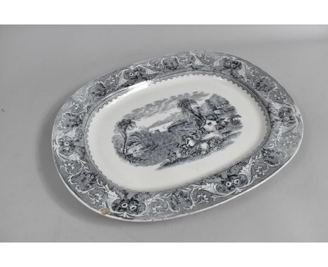 A Late 19th Century Ashworth Transfer Printed Meat Platter, Lake Scene, Makers Stamp to Back, 53cm wide (Chip to rim) 