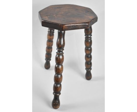 A Country Made Oak Octagonal Three Bobbin Leg Stool, 26cms Diameter 