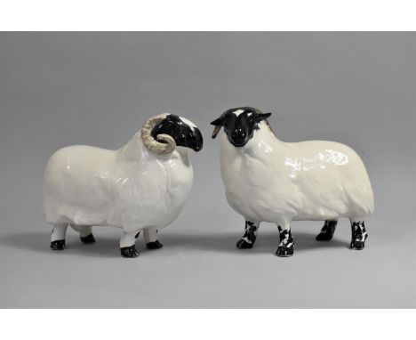 A Pair of Ceramic Sheep Ornaments by David Sharp, Each 24cms Long 