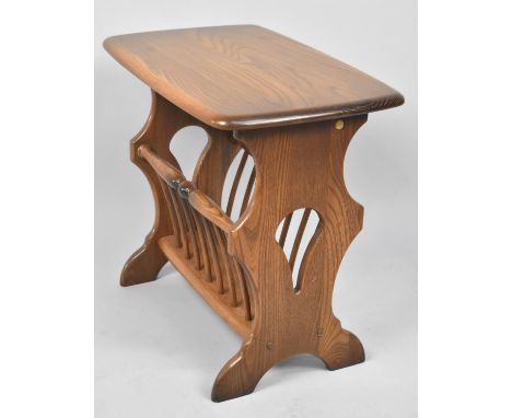 An Ercol Elm Magazine Table, 54cms Wide 