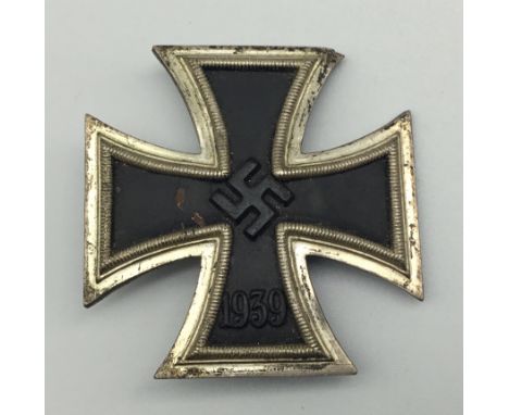 A WW2 vaulted Iron Cross 1st Class, marked ‘L/11’ in a box under the C clasp, indicating the maker of Wilhelm Deumer, Ludensc