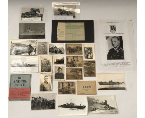 A selection of WW2 German photographs and ephemera.To include: a Deutsche Reichsbahn Berlin railway ticket, a 1943 issued Rei