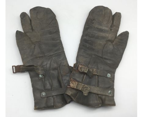 A pair of WW2 issued German Kriegsmarines leather gauntlet mittens, with trigger finger to both.Lined with sheepskin, with on