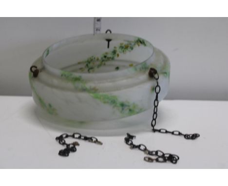 An Art Deco period green glass and opaque ceiling shade 