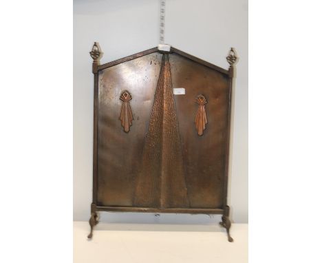 An Arts & Crafts style copper fire screen 'no postage available' 