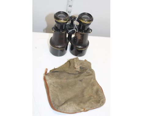 A pair of antique Heath and Co. military binoculars with broad arrow mark 